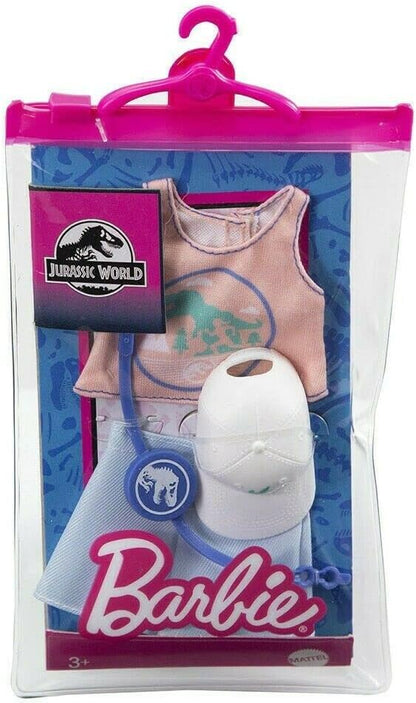 Barbie Doll Clothes Inspired by Jurassic World: Dominion, Complete Look with 2 Accessories, Pink Sleeveless Crop Top with Dinosaur Graphic & Blue Shorts, Fanny Pack & Hat, Gift for Kids 3 to 8 Years